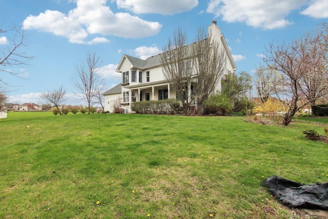 24725 Hanover Ct, Plainfield, IL 60585 - view of side of home featuring a chimney and a lawn
