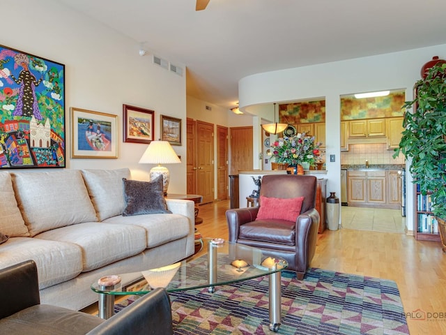 5 W Central Rd Unit 512, Mount Prospect, IL 60056 - living area featuring light wood-type flooring and ceiling fan