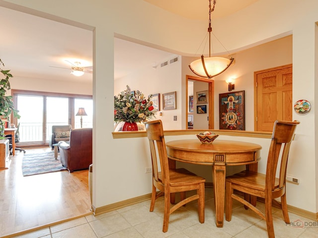 5 W Central Rd Unit 512, Mount Prospect, IL 60056 - dining area with baseboards and ceiling fan