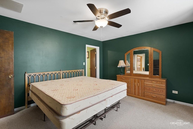 827 Lakewood Pl, Aurora, IL 60506 - bedroom featuring light colored carpet, baseboards, and a ceiling fan