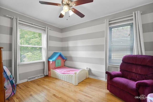 827 Lakewood Pl, Aurora, IL 60506 - bedroom featuring wood finished floors, baseboards, and a ceiling fan