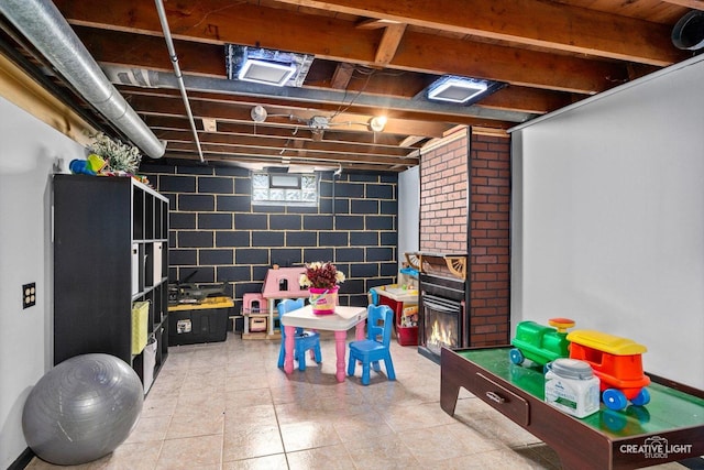 827 Lakewood Pl, Aurora, IL 60506 - basement featuring light tile patterned floors