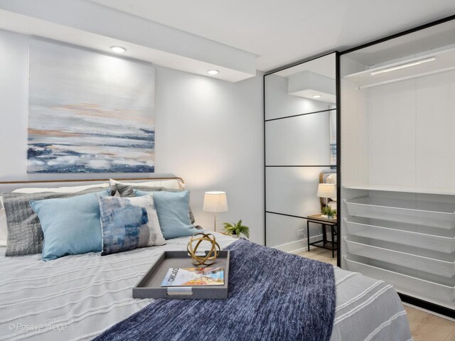 4250 N Marine Dr Unit 1929, Chicago, IL 60613 - bedroom with wood finished floors and recessed lighting