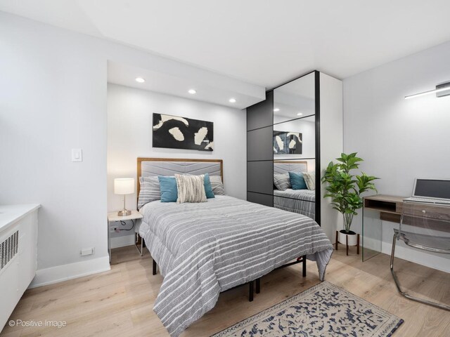 4250 N Marine Dr Unit 1929, Chicago, IL 60613 - bedroom featuring light wood finished floors, baseboards, and recessed lighting