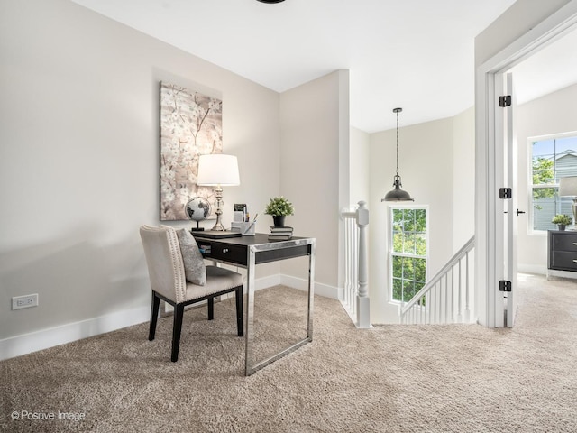 home office featuring carpet floors and baseboards