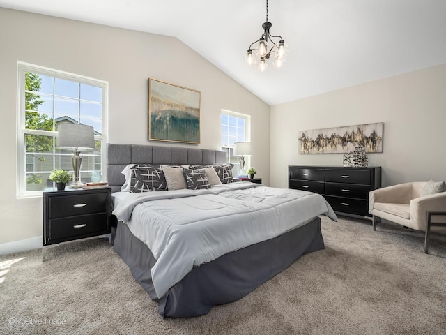 bedroom featuring lofted ceiling, a chandelier, and light colored carpet