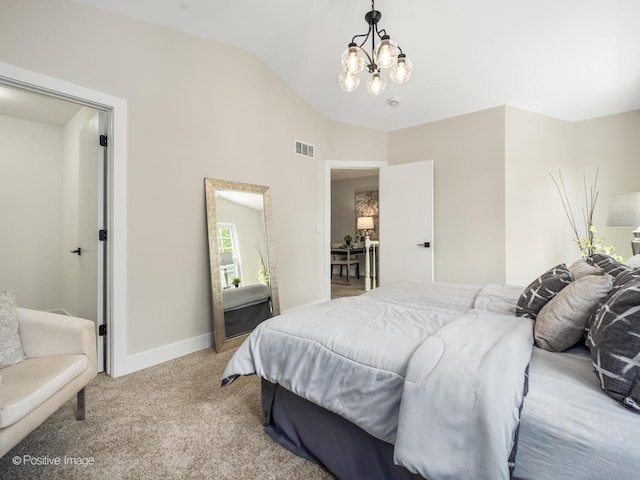 carpeted bedroom featuring vaulted ceiling, a chandelier, and baseboards
