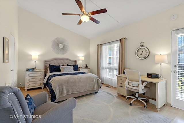 3700 N Lake Shore Dr Unit 312, Chicago, IL 60613 - bedroom with lofted ceiling, a desk, multiple windows, and light wood-style flooring
