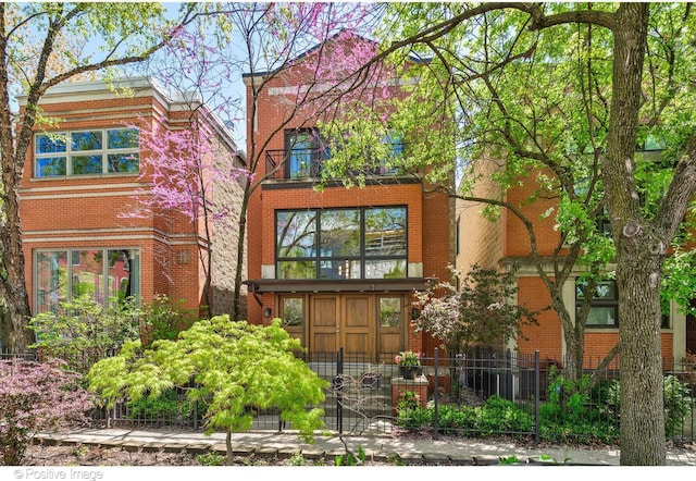1241 W Dickens Ave, Chicago, IL 60614 - view of front of property with a fenced front yard and brick siding