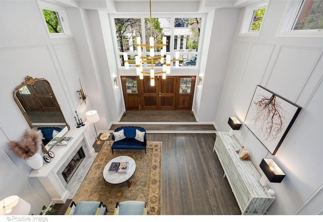 1241 W Dickens Ave, Chicago, IL 60614 - entrance foyer with a chandelier, plenty of natural light, wood finished floors, and a towering ceiling