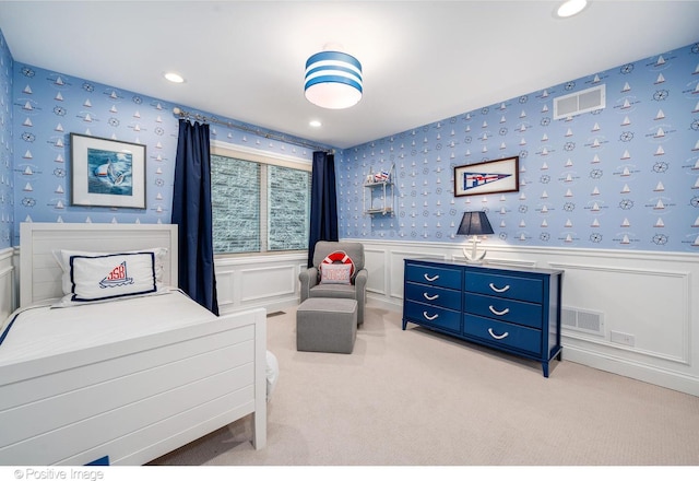 1241 W Dickens Ave, Chicago, IL 60614 - carpeted bedroom with wallpapered walls, wainscoting, recessed lighting, and a decorative wall