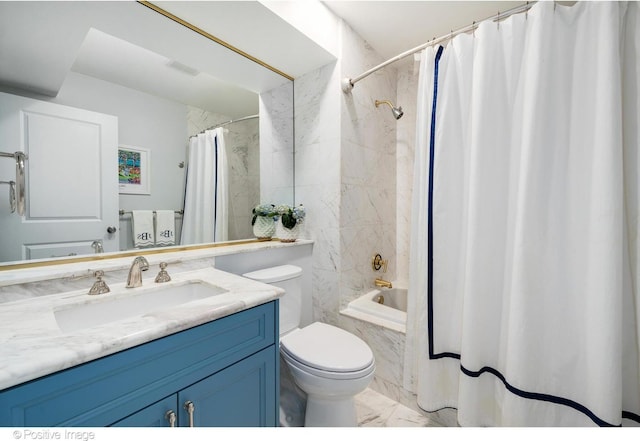 1241 W Dickens Ave, Chicago, IL 60614 - bathroom featuring marble look tiles, vanity, toilet, and shower / tub combo with curtain