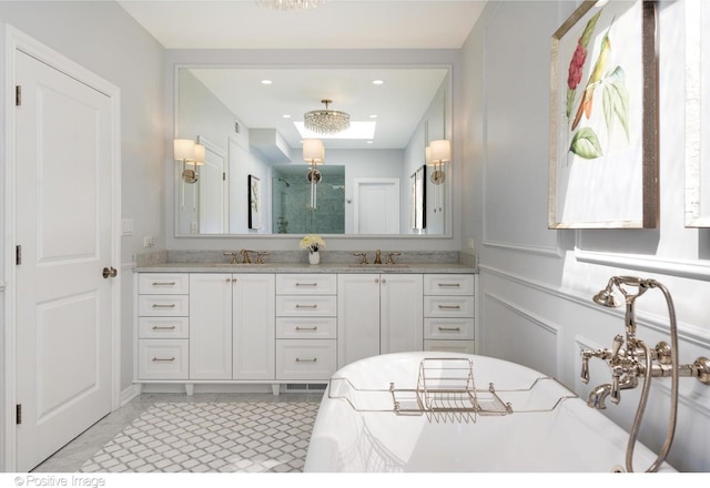 1241 W Dickens Ave, Chicago, IL 60614 - bathroom featuring a stall shower, double vanity, and a soaking tub