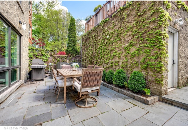 1241 W Dickens Ave, Chicago, IL 60614 - view of patio featuring outdoor dining space and grilling area