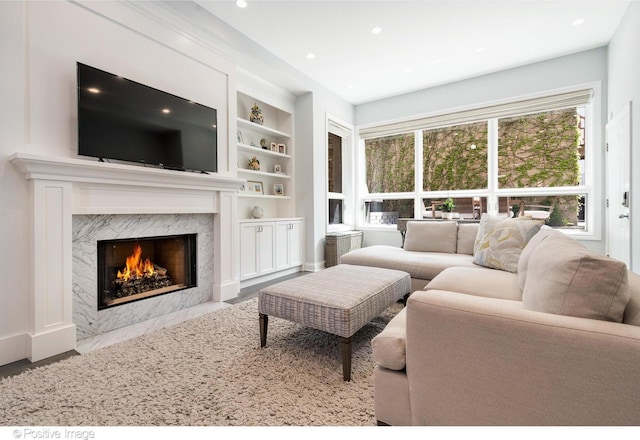 1241 W Dickens Ave, Chicago, IL 60614 - living room with a high end fireplace, recessed lighting, and built in features