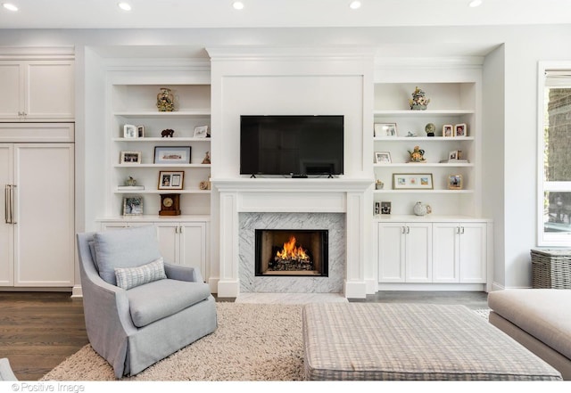 1241 W Dickens Ave, Chicago, IL 60614 - living area with dark wood-style floors, built in features, a high end fireplace, and recessed lighting