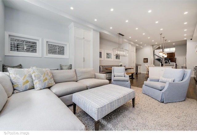 1241 W Dickens Ave, Chicago, IL 60614 - living room featuring recessed lighting, wood finished floors, a chandelier, and baseboards