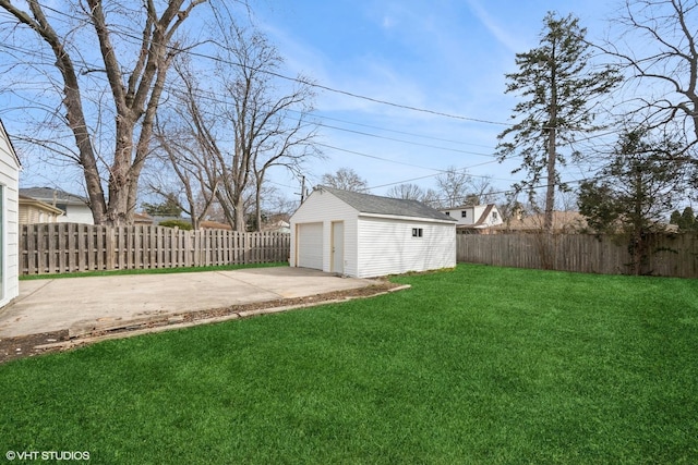 19 N Iowa Ave, Addison, IL 60101 - view of yard with an outbuilding, a detached garage, and a patio area