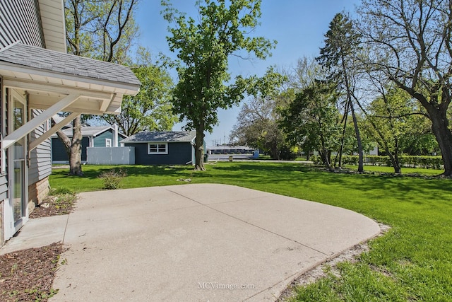 137 E Tyler St, Oswego, IL 60543 - view of patio featuring an outdoor structure