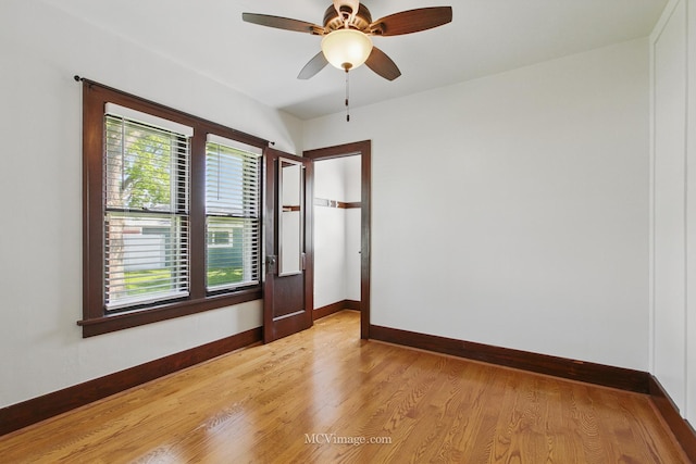 137 E Tyler St, Oswego, IL 60543 - empty room with baseboards, light wood-style flooring, and a ceiling fan