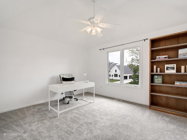 home office featuring baseboards, carpet flooring, and ceiling fan