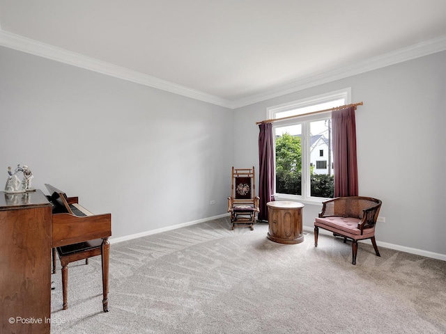 living area featuring ornamental molding, carpet flooring, and baseboards