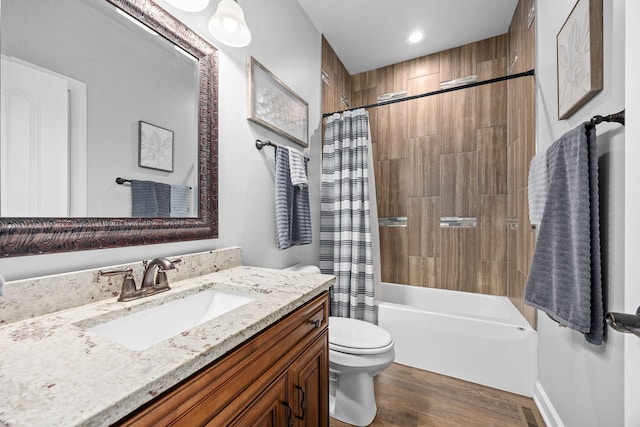 full bath featuring toilet, wood finished floors, shower / tub combo with curtain, vanity, and recessed lighting