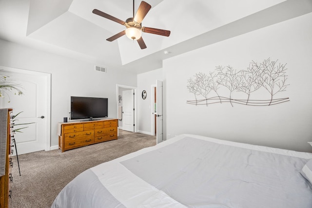 carpeted bedroom with a towering ceiling, baseboards, and ceiling fan