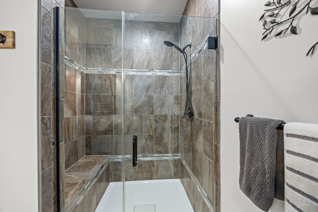 bathroom featuring a stall shower