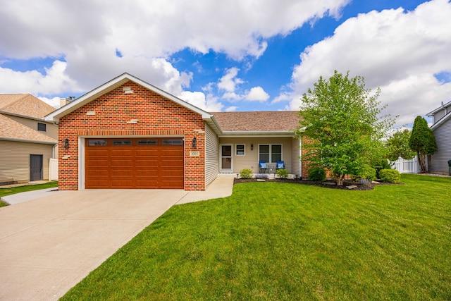view of front of property featuring driveway, brick siding, a front lawn, and a garage