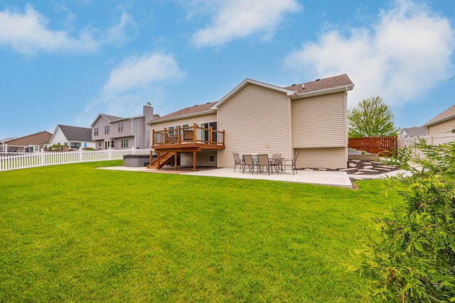 back of property featuring a patio area, stairway, and a wooden deck