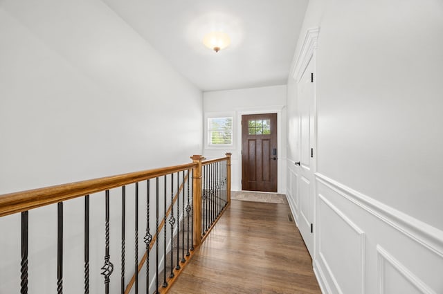entryway with dark wood-type flooring