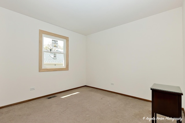 782 N Hainesville Rd, Round Lake, IL 60073 - empty room with baseboards and light colored carpet