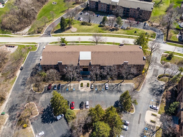 aerial view of property's location with apartment complex