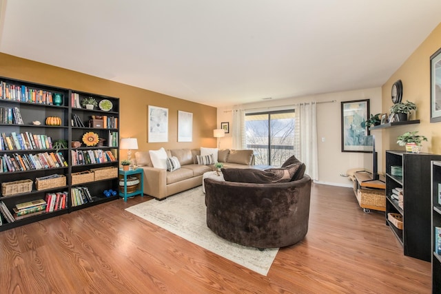 living area featuring wood finished floors
