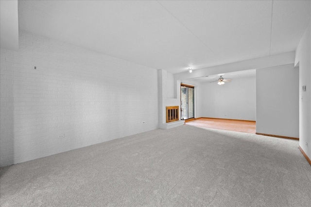 1502 Woodbridge Rd Unit 1D, Joliet, IL 60436 - unfurnished living room with carpet flooring and ceiling fan
