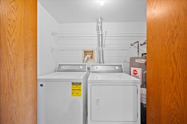 1502 Woodbridge Rd Unit 1D, Joliet, IL 60436 - laundry area featuring water heater and washer and clothes dryer