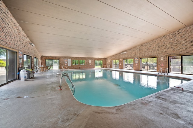 1502 Woodbridge Rd Unit 1D, Joliet, IL 60436 - indoor pool featuring a patio area