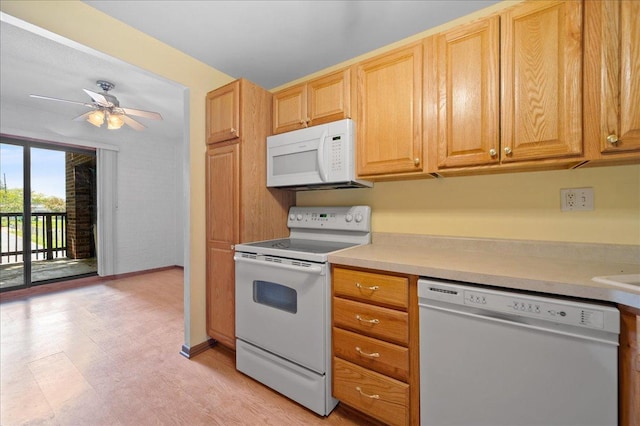 1502 Woodbridge Rd Unit 1D, Joliet, IL 60436 - kitchen with white appliances, baseboards, light countertops, and ceiling fan