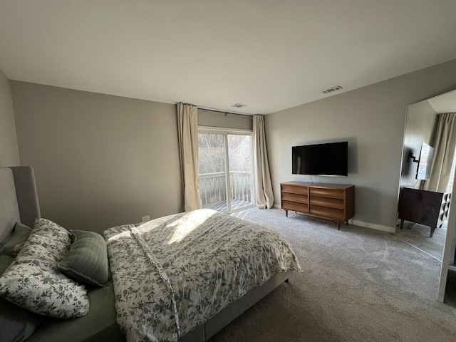 bedroom featuring carpet, access to exterior, and baseboards