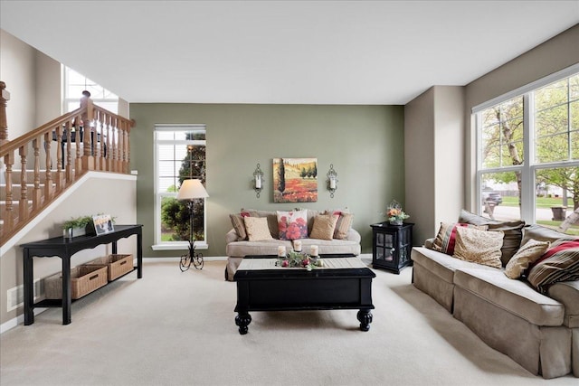 10905 Manhattan Dr, Huntley, IL 60142 - living room featuring healthy amount of natural light, light carpet, and baseboards