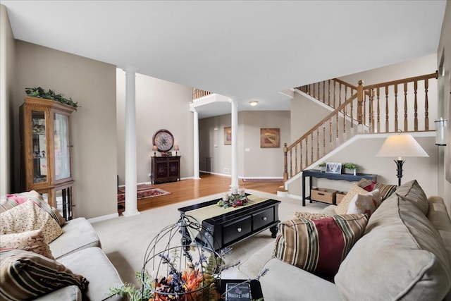 10905 Manhattan Dr, Huntley, IL 60142 - carpeted living area featuring ornate columns, stairs, and baseboards