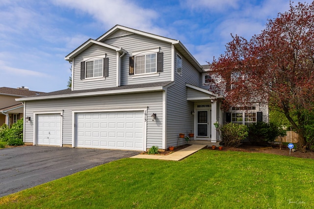 1913 Apple Valley Rd, Bolingbrook, IL 60490 - traditional home featuring a front yard, driveway, and a garage