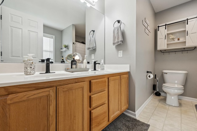 423 W Taylor St W, Dekalb, IL 60115 - bathroom featuring double vanity and tile patterned flooring