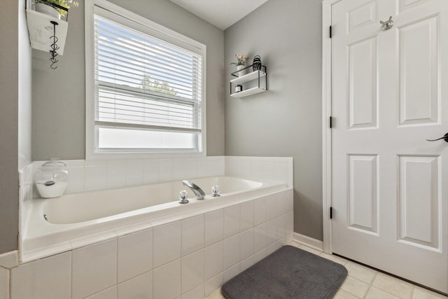 423 W Taylor St W, Dekalb, IL 60115 - bathroom featuring a bath and tile patterned floors