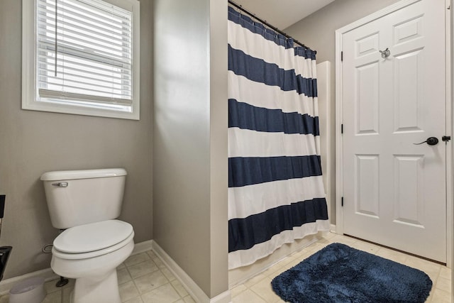 423 W Taylor St W, Dekalb, IL 60115 - bathroom with tile patterned flooring and a shower with shower curtain