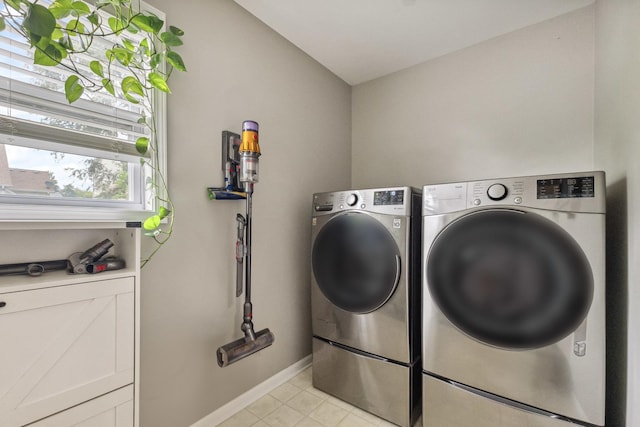 423 W Taylor St W, Dekalb, IL 60115 - laundry area with independent washer and dryer and light tile patterned floors