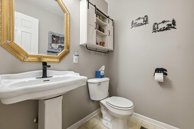423 W Taylor St W, Dekalb, IL 60115 - bathroom with toilet and tile patterned flooring