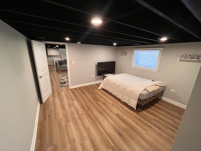 638 Paxton Ave, Calumet City, IL 60409 - bedroom featuring light wood-style floors, baseboards, and recessed lighting