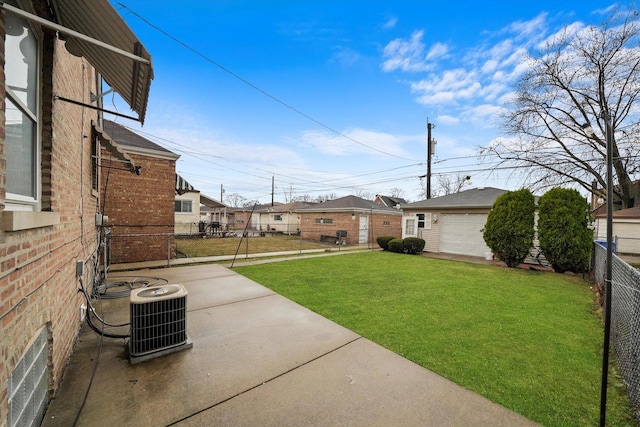 8020 S Mozart St, Chicago, IL 60652 - view of yard with central AC, a residential view, a garage, and a patio area
